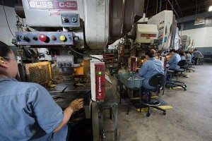 quick-way manufacturing employees working on metal stamping service 